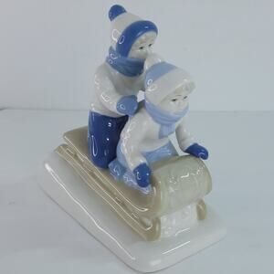 Paul Sebastian Porcelana De Cuernavaca Porcelain Children on Sled Figurine VTG